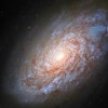 哈勃太空望远镜观测揭示宇宙年龄的标准灯塔：NGC 4414