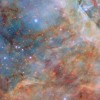 哈勃揭示了蜘蛛星云中恒星诞生的灿烂与混沌景象