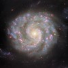 哈勃最新拍摄的螺旋星系NGC 3596图像揭示了富含早期恒星的天体漩涡