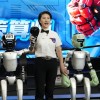 全球首个人形机器人格斗赛落幕：拳打脚踢你来我往 就是“大脑”还不好使
