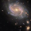 哈勃望远镜观测到遥远螺旋星系的耀眼爆炸